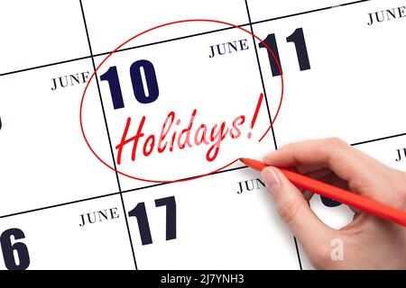 10th jour de juin. Dessiner à la main un cercle rouge et écrire le texte vacances sur le calendrier date 10 juin. Date importante. Mois d'été, jour de l'année Banque D'Images