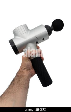 Personne tenant un pistolet de massage isolé sur fond blanc Banque D'Images