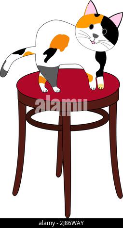 Un chat calico debout sur un tabouret rouge: Fond blanc Banque D'Images