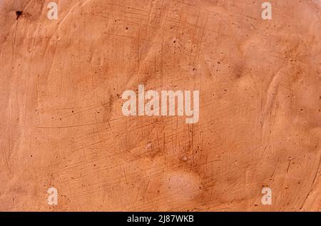 Texture de mur d'argile et fond de maison d'argile.les murs de maison sont faits d'argile. . Photo de haute qualité Banque D'Images