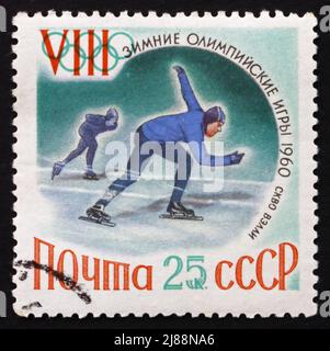RUSSIE - VERS 1960 : un timbre imprimé en Russie montre le patinage de vitesse, les sports olympiques d'hiver, Squaw Valley 60, vers 1960 Banque D'Images