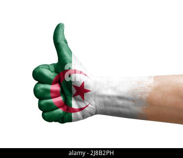 Main faire le pouce peint avec le drapeau de l'algérie Banque D'Images