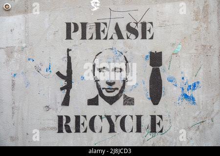 Veuillez recycler. Graffiti anti-Poutine stencil par Plan B. Street Art Banque D'Images