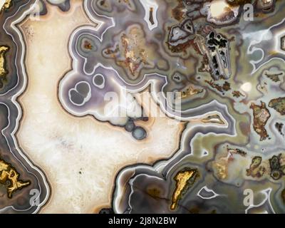 Surfaces en marbre onyx poli, semi-précieux exotique moderne quartzite structure tranche macro minérale gros plan. Banque D'Images