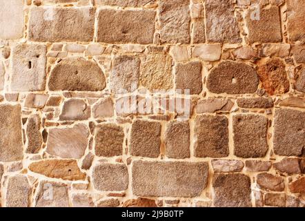 Vieux mur fait de pierres texture arrière-plan plein cadre photo Banque D'Images
