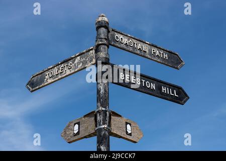 Panneaux en direction de Sheringham, North Norfolk, UK en direction de Beeston Hill Banque D'Images