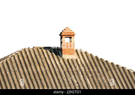 Ancien bâtiment avec cheminée en briques couverts d'ardoise Banque D'Images