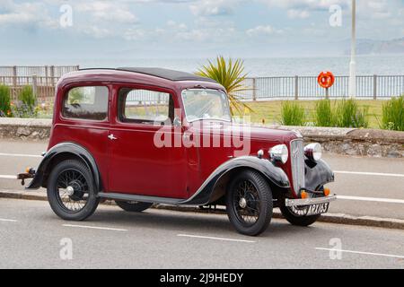 1930s Maroon vintage Austin Seven New Ruby à Exmouth Devon Royaume-Uni également connu comme le bébé Austin Banque D'Images