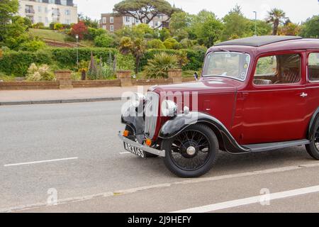 1930s Maroon vintage Austin Seven New Ruby à Exmouth Devon Royaume-Uni également connu comme le bébé Austin Banque D'Images