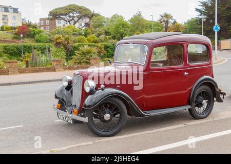 1930s Maroon vintage Austin Seven New Ruby à Exmouth Devon Royaume-Uni également connu comme le bébé Austin Banque D'Images