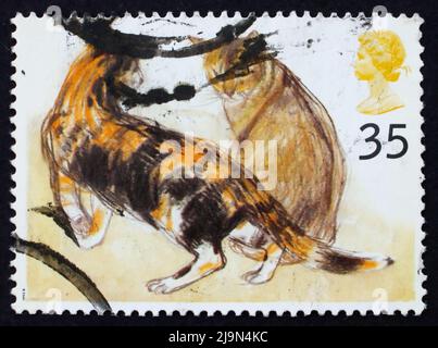 GRANDE-BRETAGNE - VERS 1995: Un timbre imprimé en Grande-Bretagne montre Calico, Abyssinian chats, vers 1995 Banque D'Images