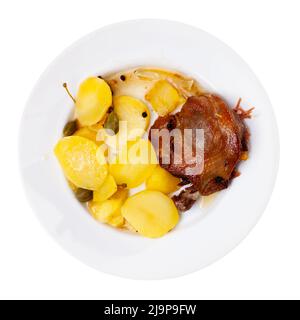 Confit de canard poêlé avec pommes de terre rôties Banque D'Images