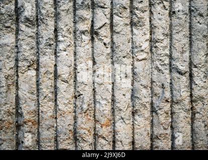 arrière-plan ou texture paroi verticale en béton rainuré Banque D'Images