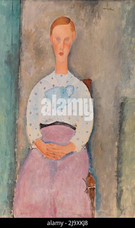 Titre: Fille avec un chemisier Polka-Dot Créateur: Amedeo Modigliani Date: 1919 Dimensions: 115 x 73 cm Moyen: Huile sur toile emplacement: Barnes Foundation Banque D'Images