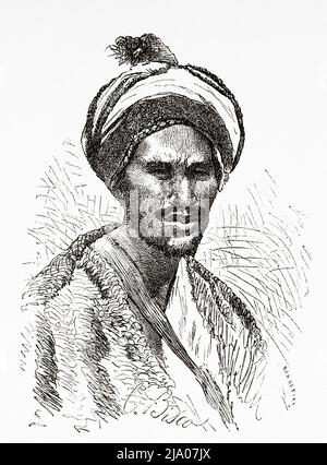 Portrait d'un homme de la tribu Beni Hassan, groupe nomade d'origine arabe, une des quatre sous-tribus des Maqil arabes qui ont émigré au Maghreb au 10th siècle, au Maroc. Nord de l'Afrique. Maroc par Edmondo de Amicis 1875. Le Tour du monde 1879 Banque D'Images