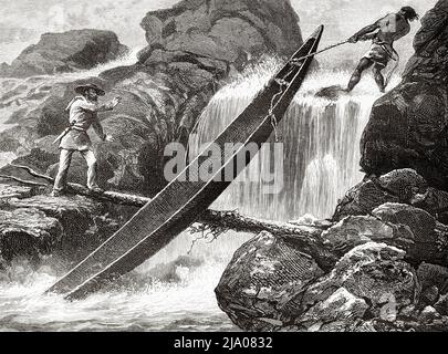 Passage d'un canoë à travers un torrent d'eau d'un rapide dans le fleuve Maroni, Guyane française, département de France, Amérique du Sud. Voyage d'exploration à l'intérieur des Guianas 1877 par Jules Crevaux. Le Tour du monde 1879 Banque D'Images