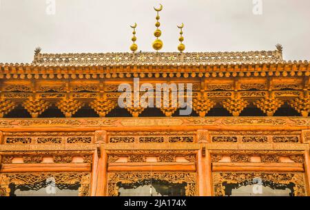 Mosquée en bois très ornée à proximité, ville de Lanzhou, province de Gansu, région de China Uighur Banque D'Images