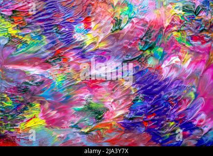 Texture créée avec une peinture de couleurs vives et variées qui crée un mélange chromatique idéal pour les textures et les arrière-plans et le design graphique Banque D'Images