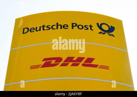 Signe et logo de Deutsche Post et DHL Banque D'Images