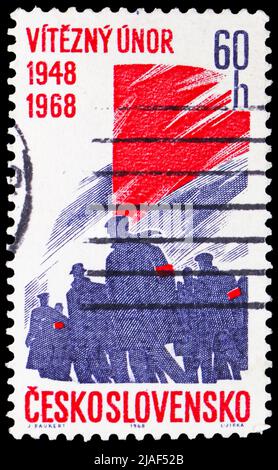 MOSCOU, RUSSIE - 14 MAI 2022: Timbre-poste imprimé en Tchécoslovaquie montre 'victorieux février', 20th anniversaire, série, vers 1968 Banque D'Images
