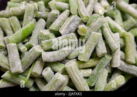 Gros plan sur les haricots verts congelés Banque D'Images