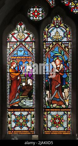 Une fenêtre en vitraux de Frederick Preedy représentant le Christ curatif le méclet et le bon Berger, Église de la Sainte Trinité, Arrow, Warwickshire Banque D'Images