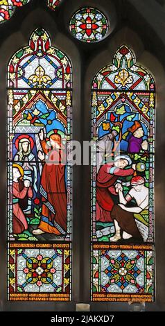 Une fenêtre en vitraux de Frederick Preedy représentant l'élévation de Lazarus & Good Samaritan, l'église de la Sainte Trinité, Arrow, Warwickshire Banque D'Images