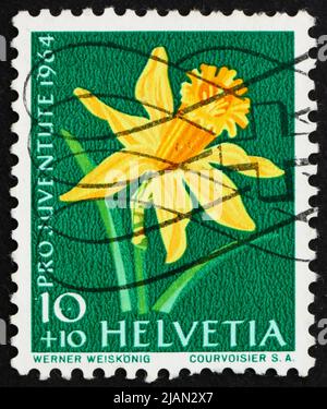 SUISSE - VERS 1964 : un timbre imprimé en Suisse montre Daffodil, Narcissus, Floraison, vers 1964 Banque D'Images