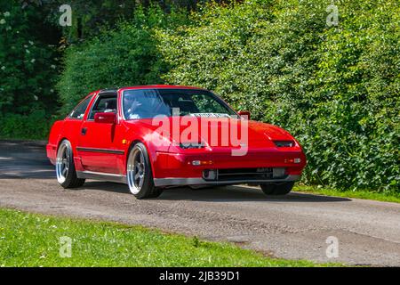 1988 80s années 80 rouge Nissan 300 ZX 300ZX 2960cc 5 vitesse manuelle 2DR coupé, arrivant à Worden Park Motor Village pour le Festival de Leyland, Royaume-Uni Banque D'Images