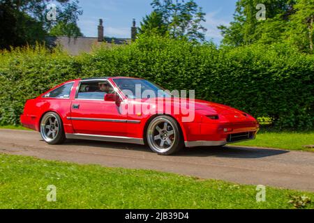 1988 80s années 80 rouge Nissan 300 ZX 300ZX 2960cc 5 vitesse manuelle 2DR coupé, arrivant à Worden Park Motor Village pour le Festival de Leyland, Royaume-Uni Banque D'Images