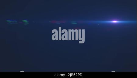 Image de taches lumineuses sur fond bleu Banque D'Images