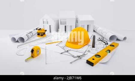Concept de plan de construction de maison. Outils pour dessiner des plans et construire des travaux. Maisons de modèles architecturaux, chapeau dur jaune, mètre et niveau à bulle abo Banque D'Images