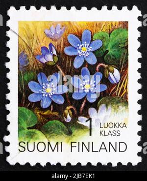 FINLANDE - VERS 1992 : un timbre imprimé en Finlande montre Hepatica, Fleur, vers 1992 Banque D'Images