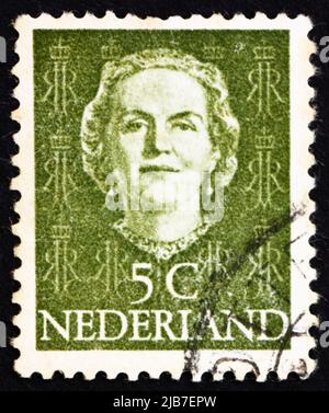 PAYS-BAS - VERS 1949: Un timbre imprimé aux pays-Bas montre la Reine Juliana, vers 1949 Banque D'Images