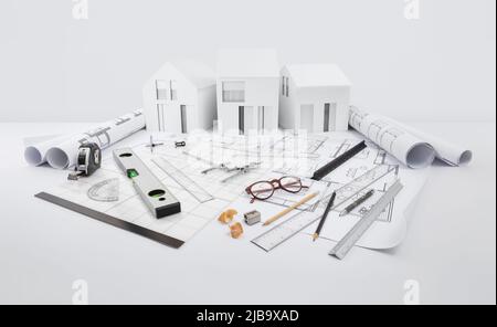 modèle architectural de maisons sur plan avec outils techniques de mesure et de dessin, bureau pour le plan de construction de bâtiment, designer d'intérieur et ar Banque D'Images