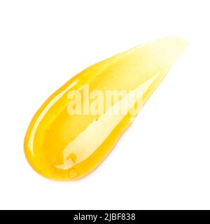 Frottis de gel orange transparent avec bulles isolées sur fond blanc vue de dessus Banque D'Images