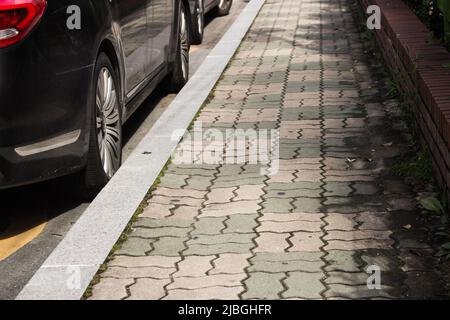 L'image du trottoir et de la voiture garée sur la route, Daegu , Corée du Sud Banque D'Images