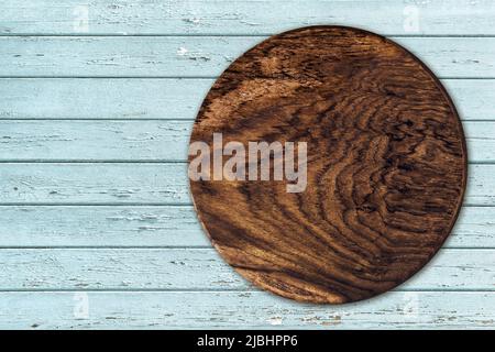 Panneau rond en bois sur fond rustique en bois texturé. Maquette de panneau de ferme Banque D'Images