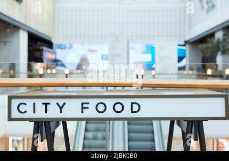 Image d'arrière-plan du logo minimal City Food à l'intérieur du centre commercial, espace de copie Banque D'Images