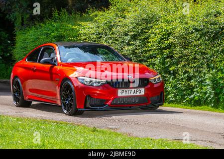 2017 (17) BMW Red orange M4 COMPÉTITION PACKAGE 2979cc essence 2DR coupé arrivant à Worden Park Motor Village, Leyland, Royaume-Uni Banque D'Images