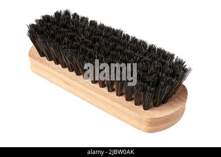 Brosse à vêtements avec manche en bois, outil de nettoyage ménager, isolée sur fond blanc Banque D'Images