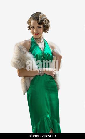 Portrait d'une jeune femme vêtue d'une robe verte en vêtements fantaisie pour Halloween Banque D'Images