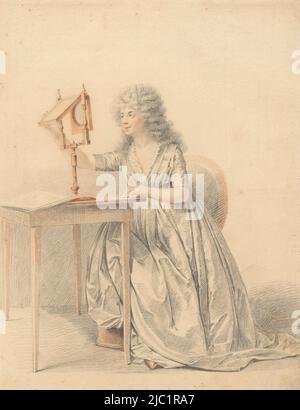 Figure étude d'une femme assise regardant à travers un miroir optique devant elle sur une table, figure étude d'une femme assise avec un miroir optique, dessinateur: Gijsbertus Johannus van den Berg, 1779 - 1817, papier, h 396 mm × l 303 mm Banque D'Images