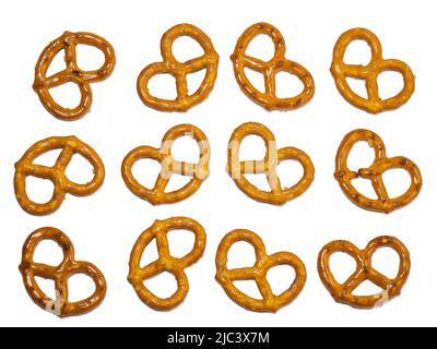 Un bouquet de bretzels. Beaucoup de pièces. Pâtisseries d'une forme inhabituelle intéressante. Arrière-plan bretzel. Banque D'Images