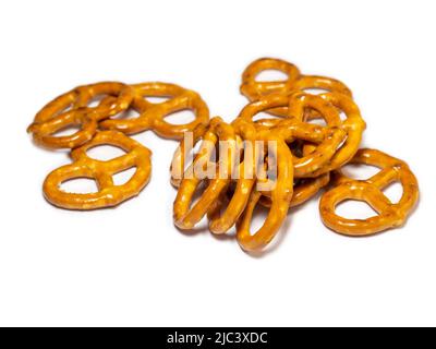 Un bouquet de bretzels. Beaucoup de morceaux.pâtisseries d'une forme inhabituelle intéressante.fond Pretzel. Banque D'Images