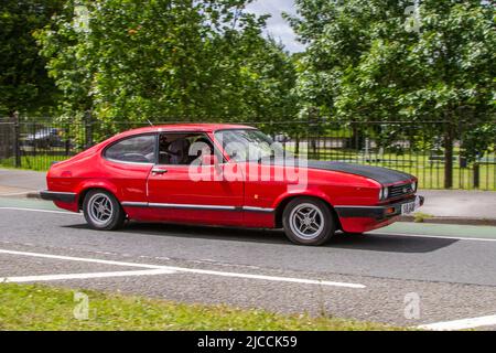 Années 1986 80 années 80 rouge FORD Capri 1993 cc essence 2dr coupé automobiles présentées au cours de la 58e année de la Manchester à Blackpool Touring Assembly pour Veteran, Vintage, Classic et Cherished voitures. Banque D'Images