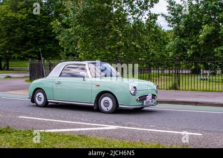 1991, 90s, années 90 NISSAN Figaro 998cc essence; voitures présentées pendant les 58th années de l'Assemblée de tourisme de Manchester à Blackpool pour les voitures anciennes, anciennes, classiques et chères. Banque D'Images