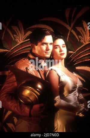 JENNIFER CONNELLY et BILLY CAMPBELL dans LE ROCKETEER (1991), dirigé par JOE JOHNSTON. CREDIT: TOUCHSTONE PHOTOS/SIVER SCREEN PARTNERS IV/GORDON COMPANY / ALBUM Banque D'Images