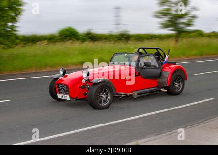 1999 90s années quatre-vingt-dix rouge CATERHAM SUPERLIGHT Seven 7 (S3) 1588cc roadster à essence; classique, moderne, des supercars et des véhicules spécialisés en route vers Lytham St Annes, Lancashire, Royaume-Uni Banque D'Images