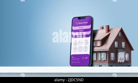 Application Smart Home Control sur smartphone et maison modèle, concept domotique, espace de copie vierge Banque D'Images